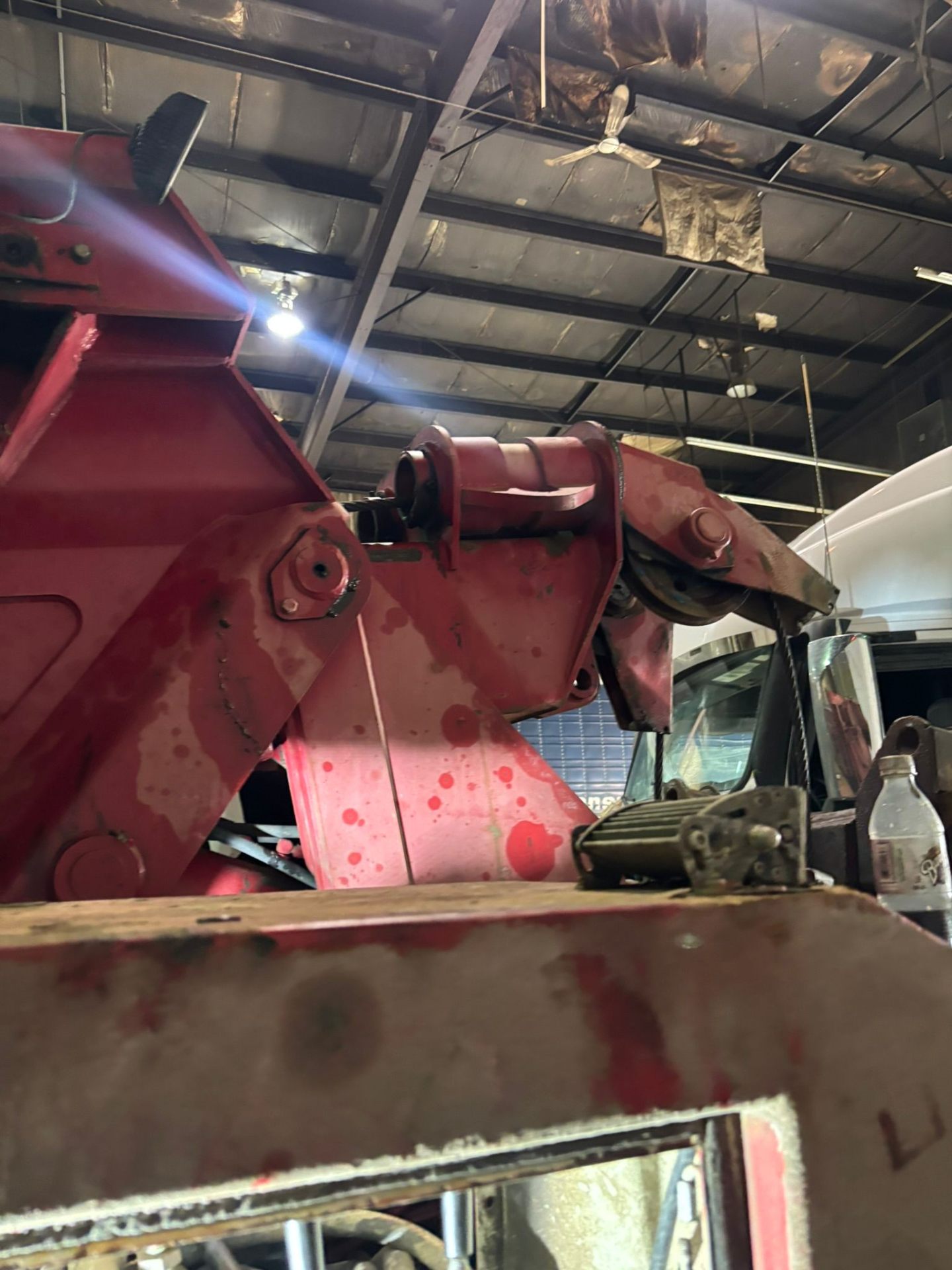 Heavy-duty tow truck boom assembly serviced in-shop